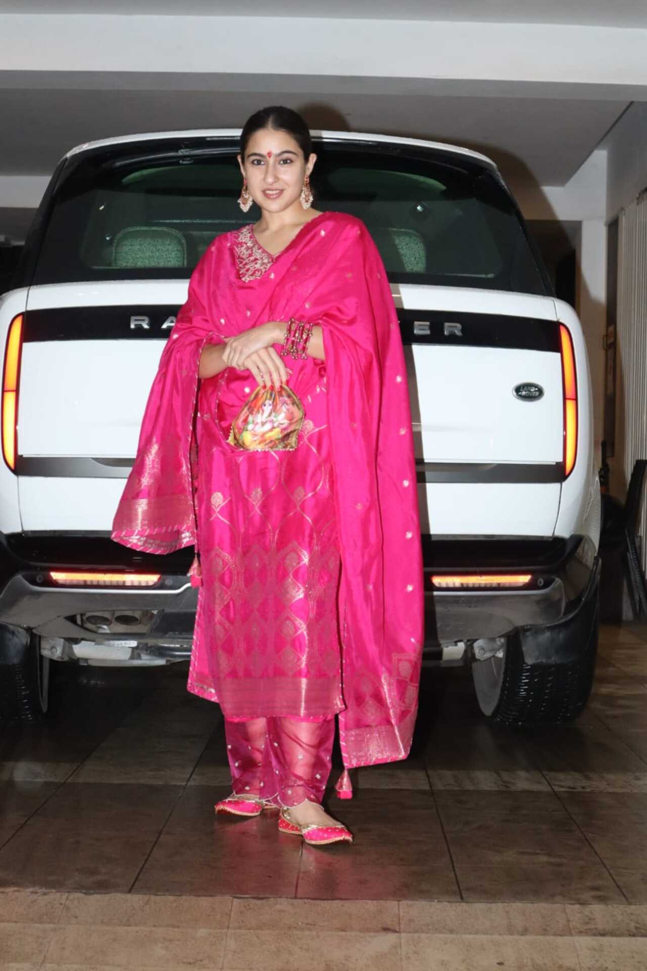Sara looked gorgeous in a dark pink embroidered kurta, pyjama and dupatta set. She completed her look with statement earrings and matching pink bangles